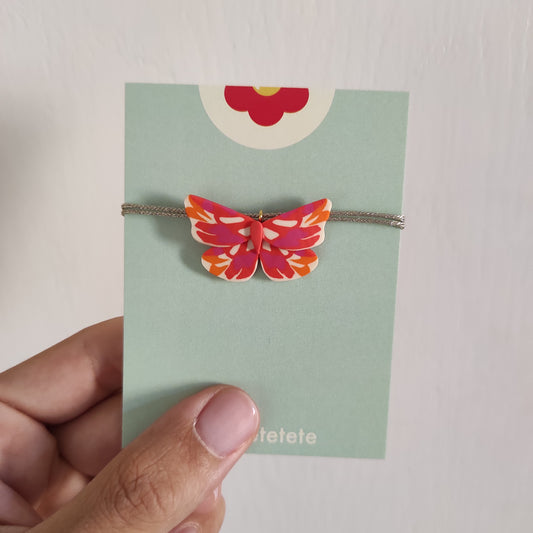 Orange and fuchsia butterfly necklace