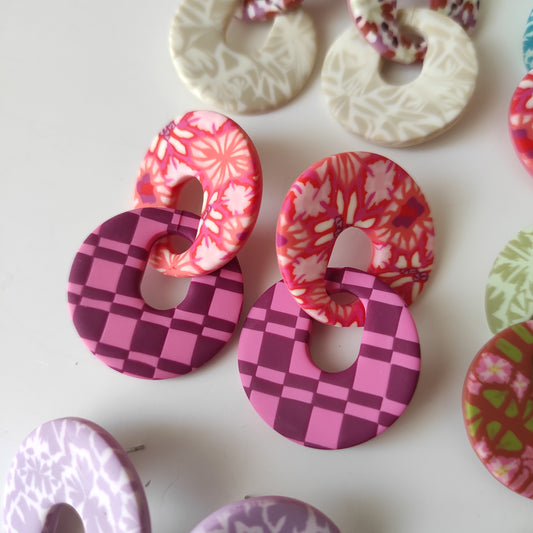 Nora rojo, naranja y rosa