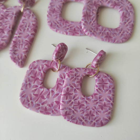 Amelia rosa y violeta