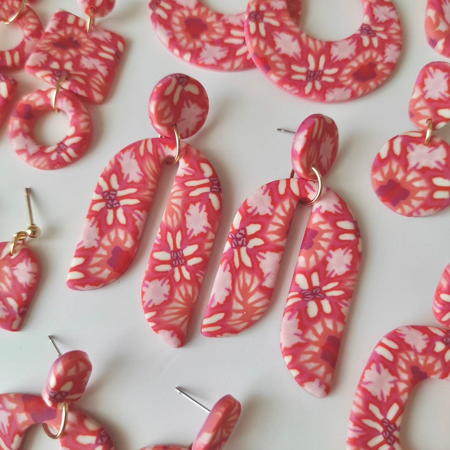 Eva flores rojas, rosas y naranjas