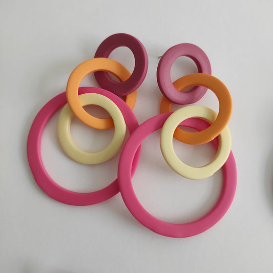 Sole granate, naranja y rosa